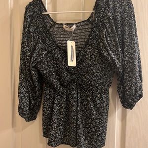Babydoll top. NWT. Impressions. Floral pattern, size large.